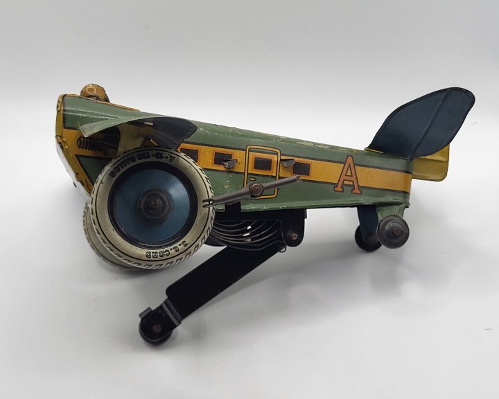 Vintage Tin Litho Wind-up Rollover Airplane Toy