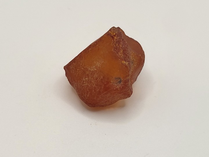 Weathered exterior of rough amber
